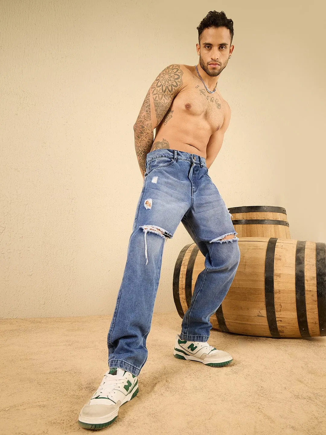 Mid Wash Blue Knee Ripped Relaxed Tapered Fit Jeans