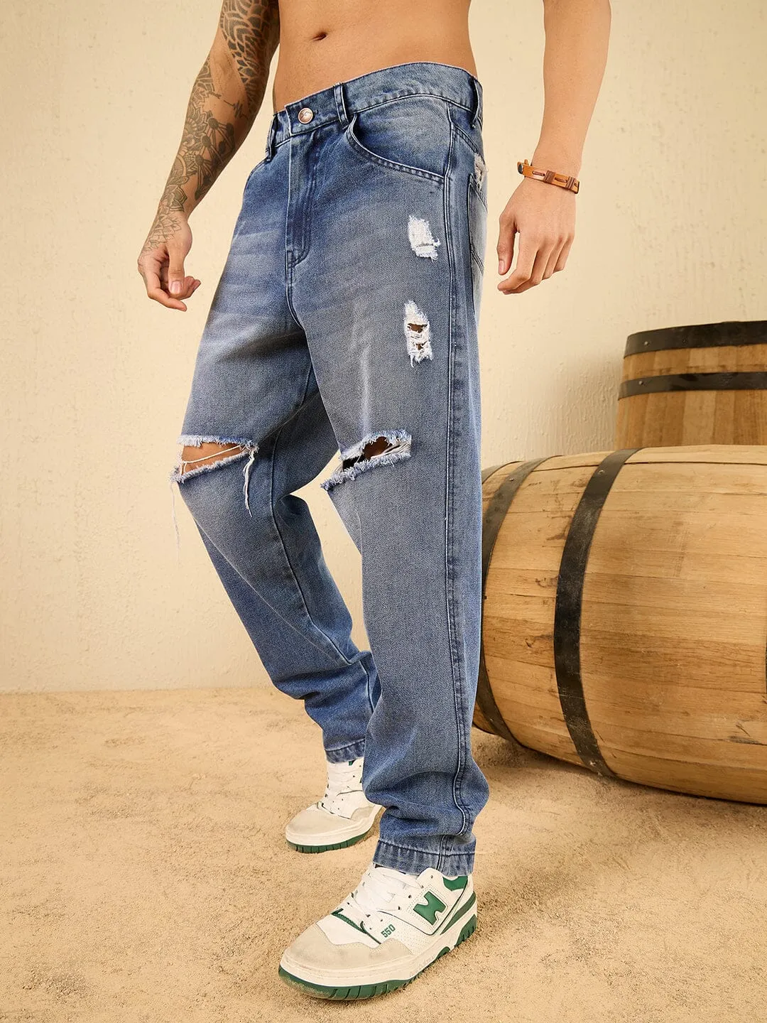 Mid Wash Blue Knee Ripped Relaxed Tapered Fit Jeans